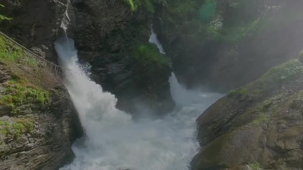 Waterfall with torrential river alt