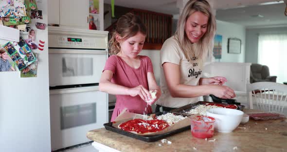 Mother And Daughter Make The Pizza