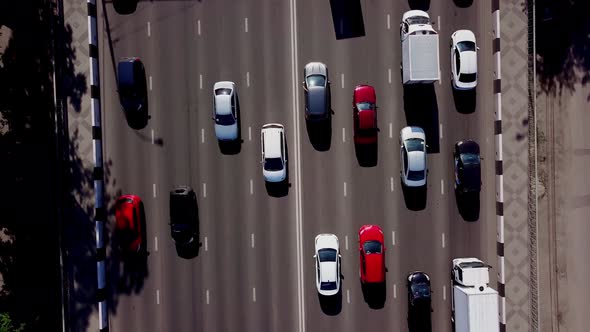 Drone's Eye View - Aerial Top Down View of Urban Traffic Jam alt
