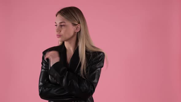 Blonde Woman in a Jacket is Outraged alt