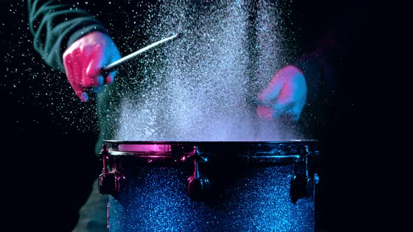 Super Slow Motion Shot of Drum Hit and Splashing Water at 1000 Fps alt