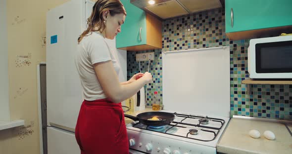 Woman Cooking Fried Eggs at Home Original Audio Included alt