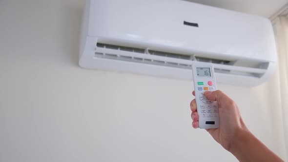 Cool Air Conditioner with Remote Control Female Hand Abnormal Heat Heat Rescue