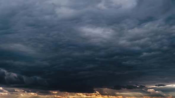 Majestic Amazing Time Lapse of Storm Cumulus Clouds Moves in the Sky at Sunset alt