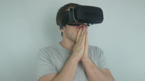 Man In A Helmet Of Virtual Reality Uses Modern Technologies Of Virtual Reality