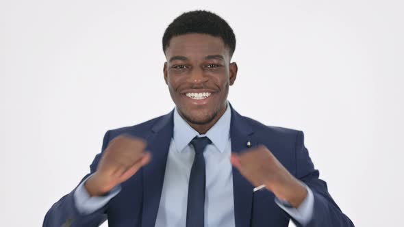 Successful African Businessman Celebrating on White Background alt