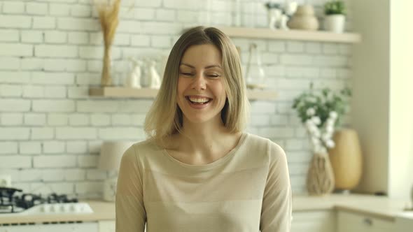 Laughing Smiling Kind Blonde Girl Portrait with Mole on Face