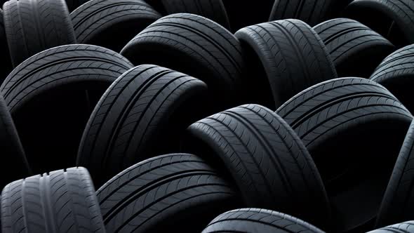 Endless chaotic stack of new tires. Automotive modern manufacturing rubber.