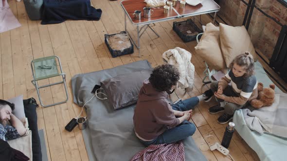 People in Indoor Camp alt