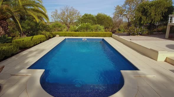 Luxurious Swimming Pool Near the Residence with a Garden with Clear Water for Tourists alt