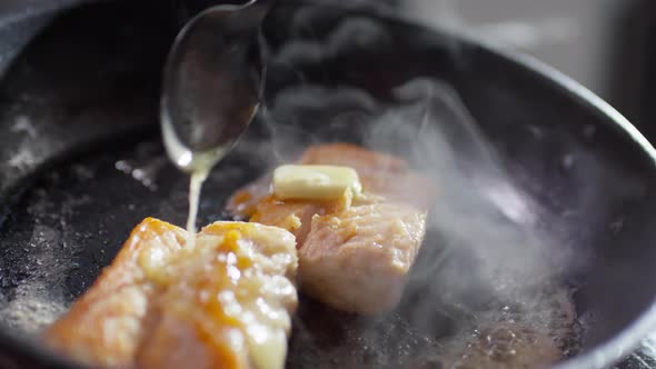 Cooking Fish Fillet with Butter in Frying Pan alt