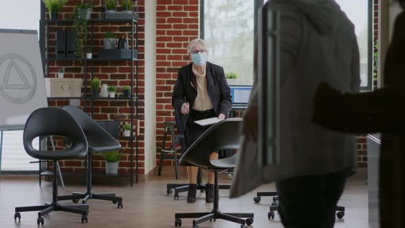 People Arriving at Aa Group Meeting Session with Psychologist During Pandemic alt