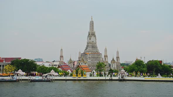 Wat Arun and Chao Phraya River in Bangkok, Thailand, a City Skyline Cityscape of Famous Buddhist Tem alt