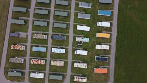 Shooting From Above a Caravan of Houses for Greenhouse Workers