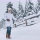 Beautiful Blonde Woman Walking By Snowy Countryside and Throwing Up Snow - VideoHive Item for Sale