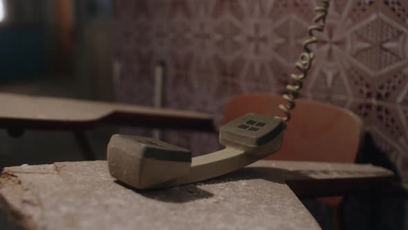 Old skool telephone dropped and forgotten at a Ukraine bunker alt