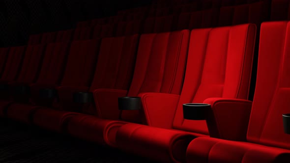 Red velvet movie theatre cinema seat chairs with dolly tracking shot
