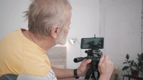 Elderly Man and Technology, Modern Grandfather Is Socially Active and Has His Own Blog Sets Up alt