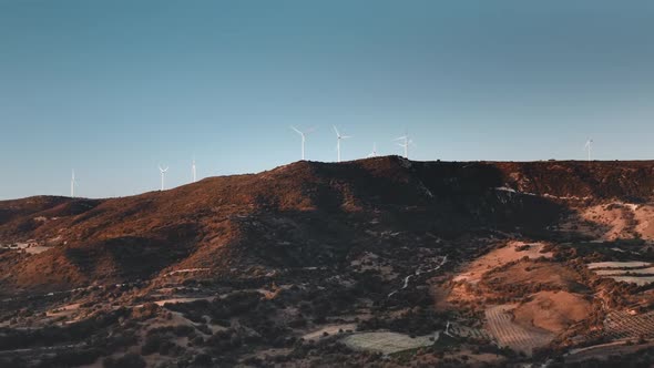 Modern Wind Turbines Windmills Rotate Produce Alternative Electricity Energy in Wild Landscape