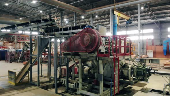 Working Industrial Conveyor Moves Stones at a Plant alt