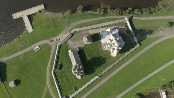 a Cinematic Shot From the Air Around the Wooden Walkway of Kizhi alt