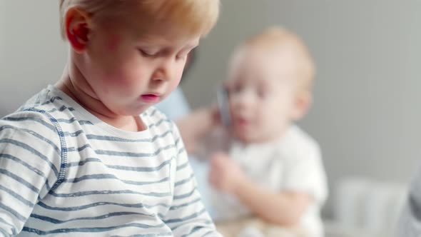 Cute Kid Playing on Tablet