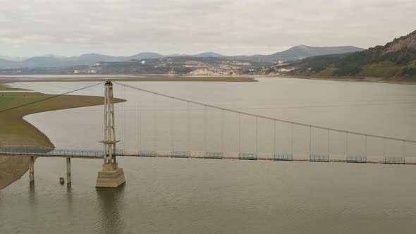 Old Pedestrian Rope Bridge From Aerial  alt