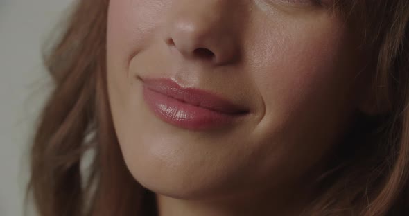 Beautiful Woman With Red Lipstick Biting Lip alt