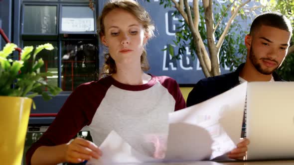 Executives working in cafeteria 4k alt