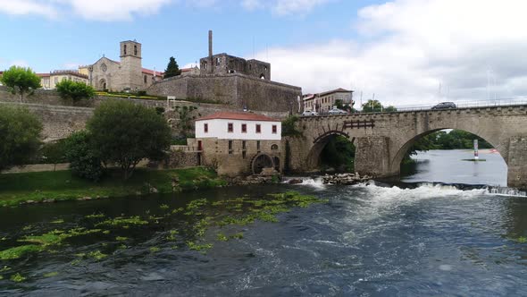 Old Watermill on the River in City of Barcelos, Portugal alt