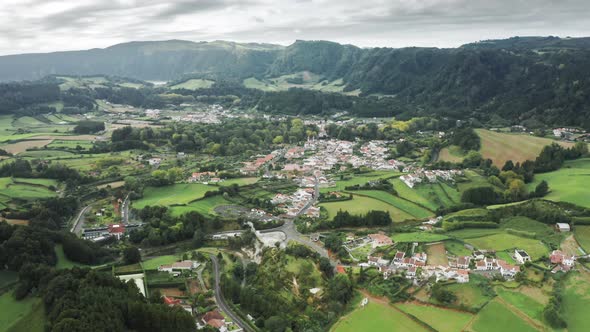 Drone Footage of the Settlement Within a Volcanic Island alt
