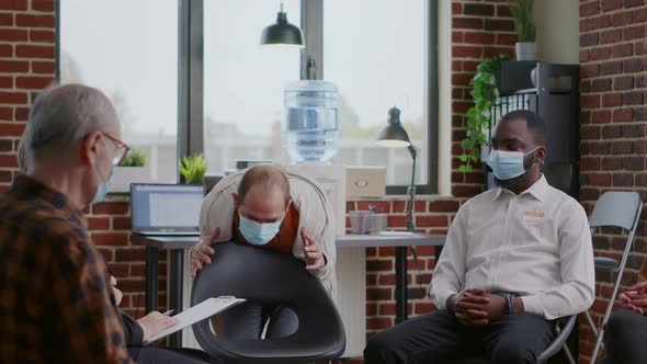 Man with Anger Management Issues Having Nervous Reaction at Aa Group Meeting alt