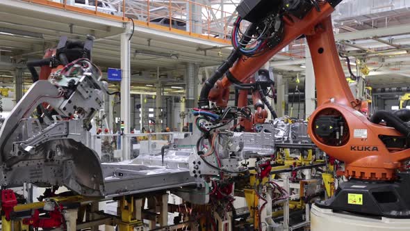 Modern Car Plant Highprecision Welding By Robots Closeup