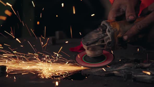 Professional Mechanic is Cutting Steel Metal alt