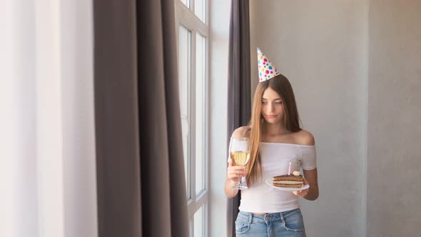 Birthday Young Woman Carrying Cake and Glass of Wine.