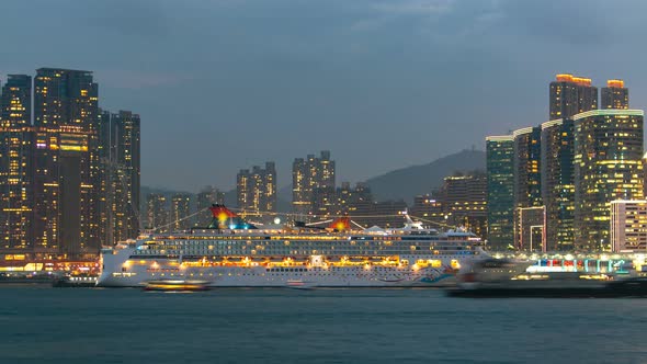 Shyline Panorama Timelapse Day To Night with Towers and Cruise Liner in West Kowloon Hong Kong alt
