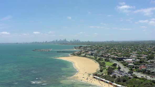 Dendy Street Beach in Melbourne Seen From the Air with the Melbourne Skyline alt