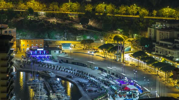 Cityscape of Monte Carlo Monaco Night Timelapse with Yachts and Traffic on Embankment alt