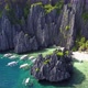 Aerial View of Secret Lagoon with Karst Cliffs and White Beach. El-Nido, Philippines - VideoHive Item for Sale