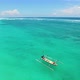 Aerial View over a Local Wooden Boat near Pantai Pandawa Beach, Nusa Dua, Bali, Indonesia. - VideoHive Item for Sale