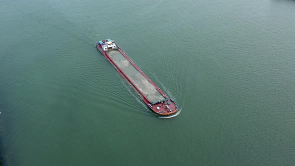 Aerial View of a Bulk Carrier Ship Moving Silt and Sand alt