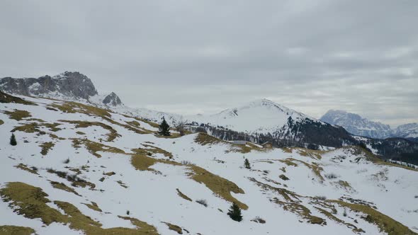 Aerial, Winter Landscape In Dolomites Mountains On A Cloudy Day In Italy