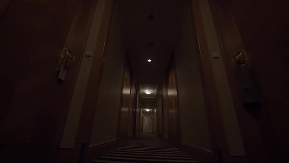 Seen the hotel corridor with closed doors of rooms alt