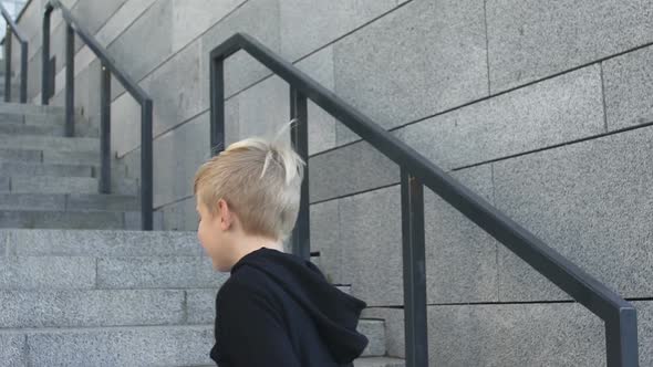 Little Kid Running Out of Subway, Childhood Security in Big City, Slow Motion alt