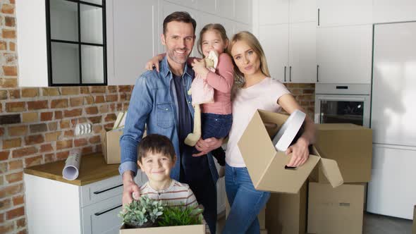 Video of portrait of family in a new apartment. Shot with RED helium camera in 8K. alt