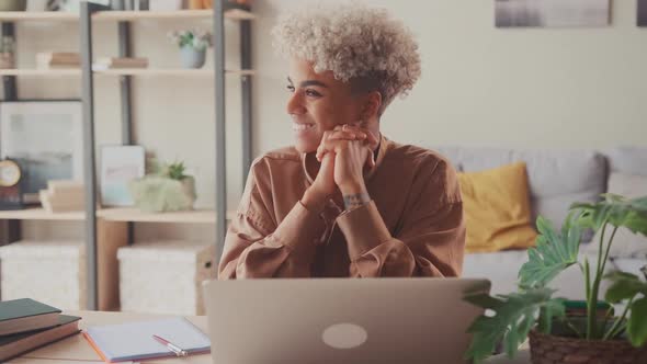 Happy Millennial African Business Woman Use Computer Visualize Career Success alt