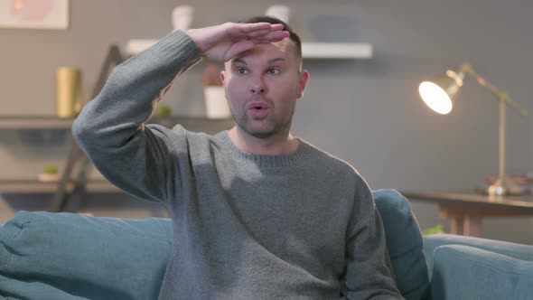 Portrait of Casual ManLooking Around Searching alt