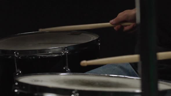 Close Up of Drummer Playing on Drum Kit Slow Motion alt