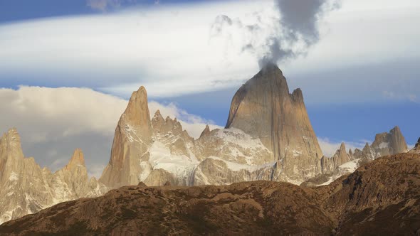 Mediun shot of Mount Fitz Roy with clouds on the top in Patagonia Argentina alt