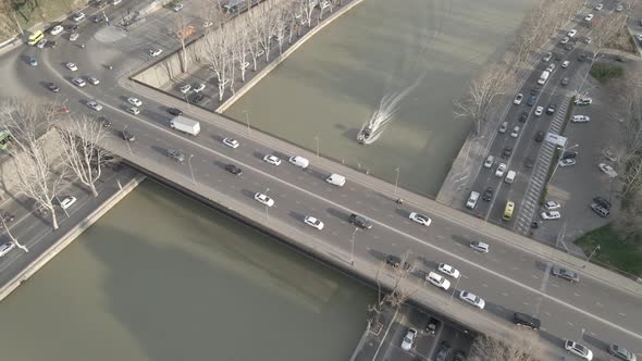 Tbilisi, Georgia - April 5 2021: Aerial view of Baratashvili Bridge and Public Registry. alt